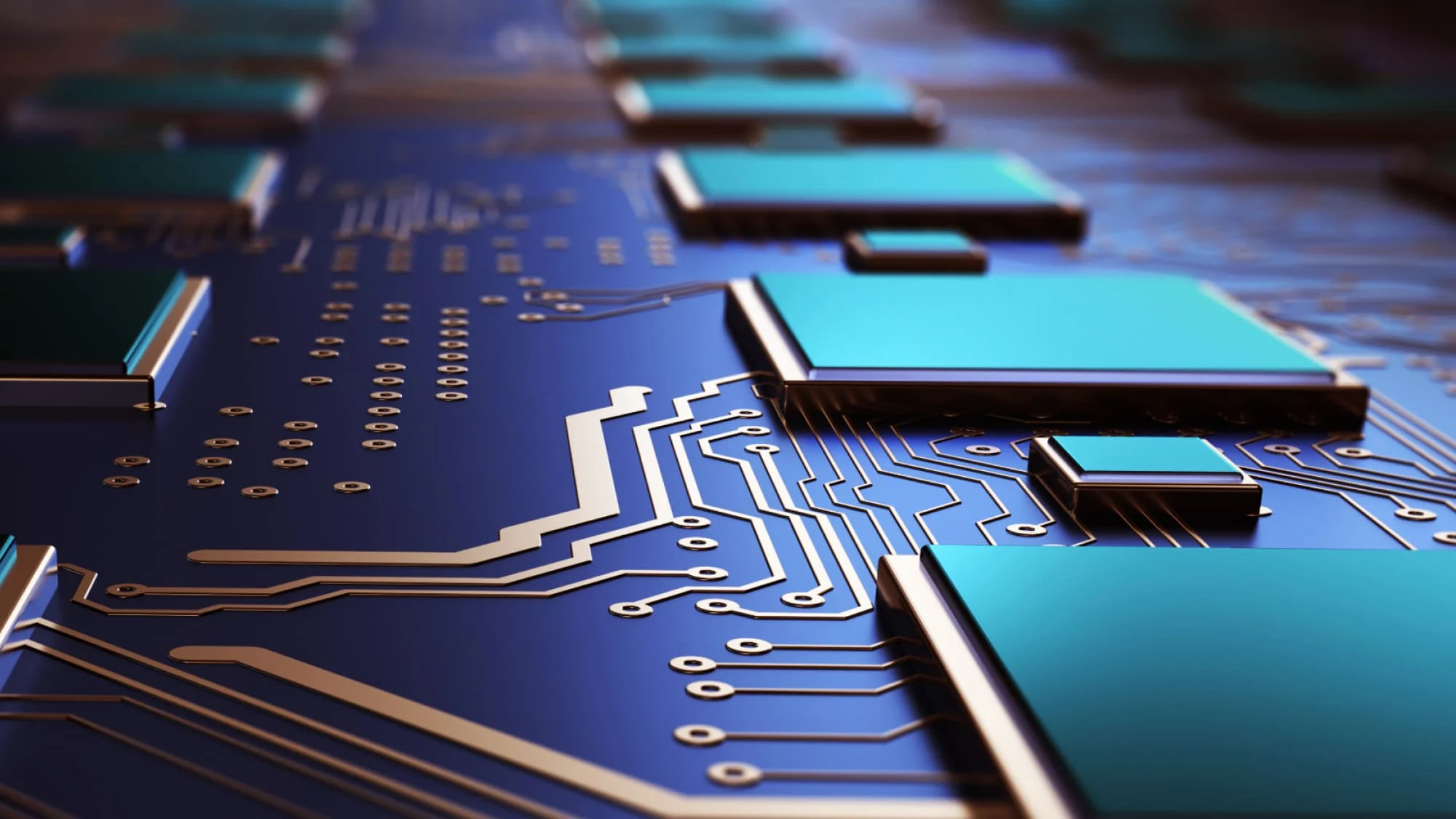 Close-up of a computer motherboard by Betechit, showcasing intricate gold circuits and blue square components. The background right shows a soft-focus extension of the motherboard. The image highlights the detailed and complex nature of electronic hardware. | BeTechIT