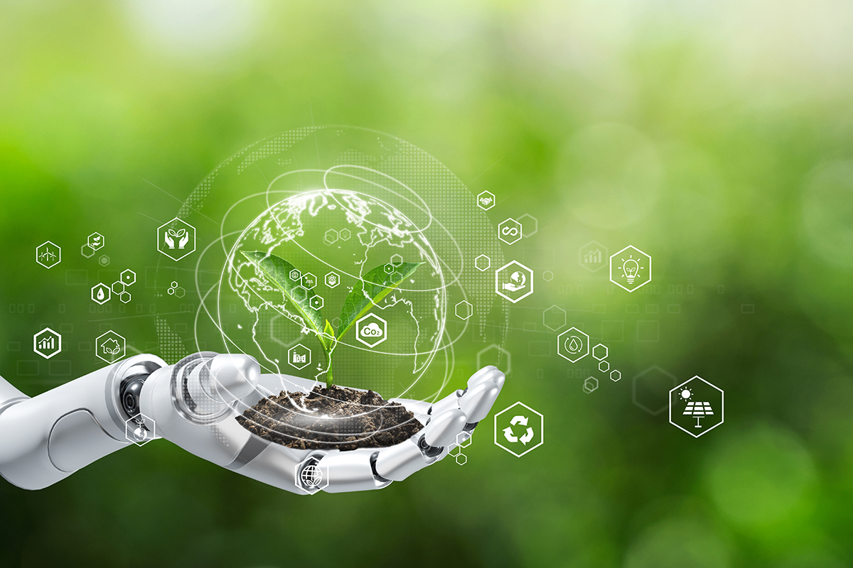 A robotic hand holds a clump of soil with a virtual overlay of a green Earth and various environmental icons, such as trees, wind turbines, and recycling symbols. The background is a blurred green, representing nature. The image conveys sustainable technology and tech for good initiatives. | BeTechIT