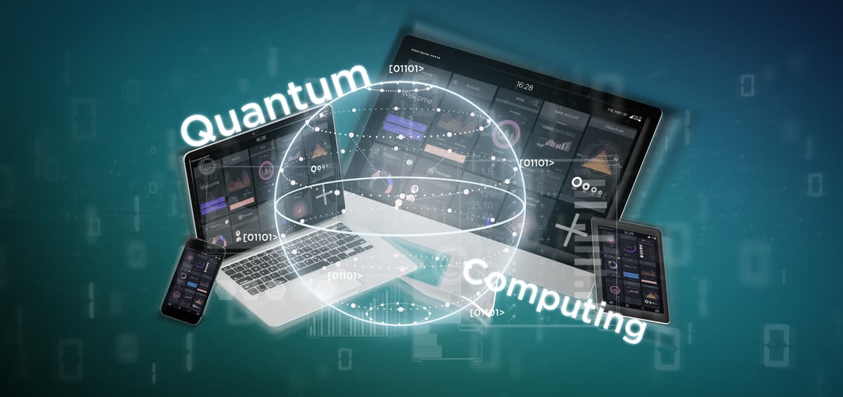 Digital illustration of laptops and smartphones displaying data charts, with a glowing sphere of binary code and the words “Quantum Computing” overlaid, representing advanced computer technology concepts. | Betechit.com
